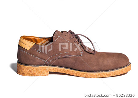 Side view on men's brown lace-up shoe made of suede isolated on a white Side view on men's brown lace-up shoe made of suede isolated on a white 96258326