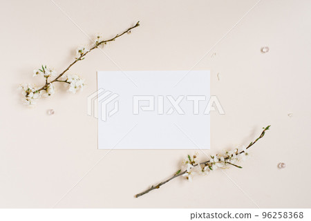 Top view of blank notepad among spring apple flowers 96258368