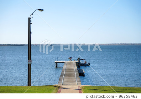 man working on a pier 96258462