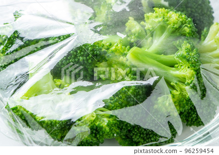 Wrapped ingredients (boiled broccoli). Wrapped ingredients (boiled broccoli). 96259454