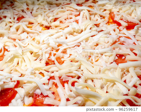 Cheese and tomatoes based pizza close-up. Cheese and tomatoes based pizza close-up. 96259617