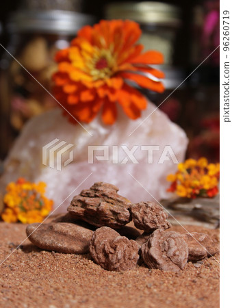 Desert Rose Rocks From Oklahoma on Red Sand. Meditation Table Close up Desert Rose Rocks From Oklahoma on Red Sand. Meditation Table Close up 96260719