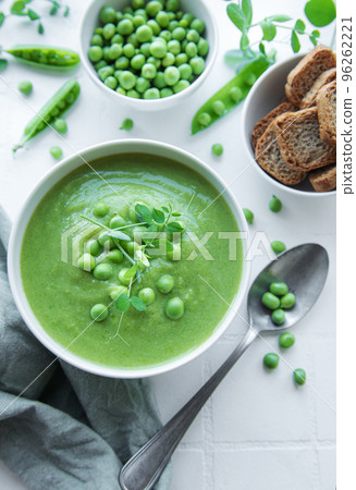 Fresh vegetable soup made of green peas Fresh vegetable soup made of green peas 96262221