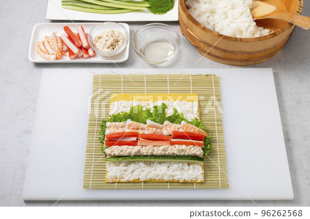 making egg roll sushi 96262568