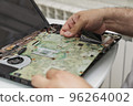 master opens laptop for repair 96264002