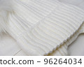 white knitted hat close-up. 96264034