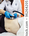Radiofrequency lifting of the abdomen and lateral parts. Anti-cellulite massage with cavitation and RF lifting apparatus. 96264205