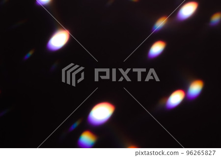 colorful rainbow crystal light leaks on black background 96265827