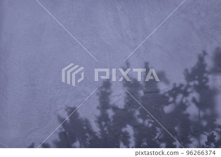 Shadow of flowers on purple concrete wall texture background Shadow of flowers on purple concrete wall texture background 96266374