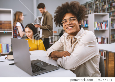 University students are studying in a library together. Concept of teamwork and preparation 96266724