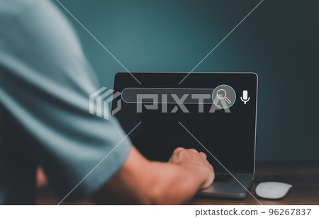 Data Search Technology , Engine Optimization. Man's hands using a laptop computer to searching for information, job, business, shopping online by Search Console on the website.. Data Search Technology , Engine Optimization. Man's hands using a laptop computer to searching for information, job, business, shopping online by Search Console on the website.. 96267837