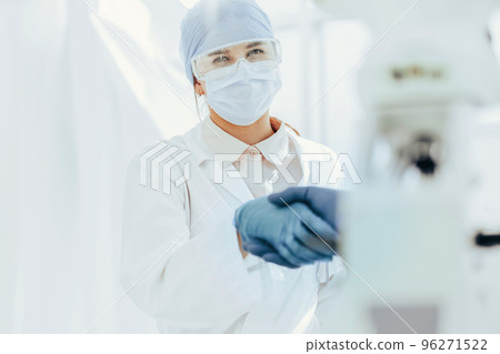 close up. Microbiology scientists shaking hands. science and health. close up. Microbiology scientists shaking hands. science and health. 96271522