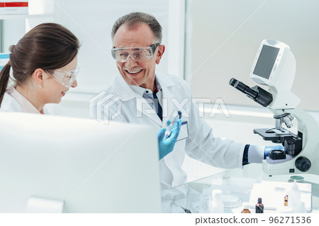 close up. staff of the research lab working on a new vaccine . 96271536