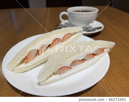 Fresh strawberry sandwich and coffee Fresh strawberry sandwich and coffee 96271691