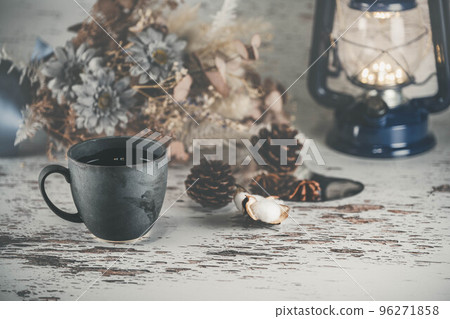 coffee cup and dried flowers coffee cup and dried flowers 96271858