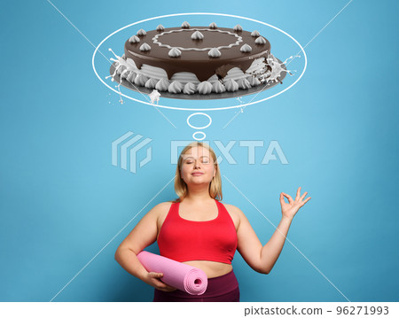 Fat girl does gym at home but she always thinks about sweets. Cyan background 96271993