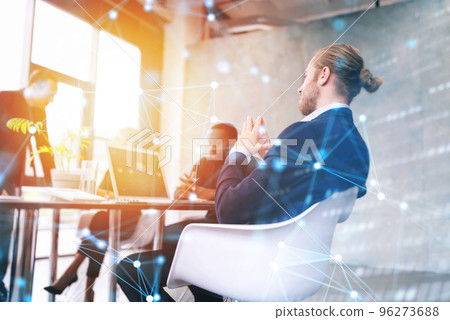 Hipster business man in elegant suit is on business meeting in the office. Network effects Hipster business man in elegant suit is on business meeting in the office. Network effects 96273688