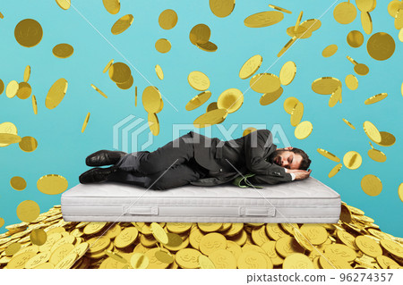 Businessman sleeps serene over a pile of golden coins. concept of wealth and good investment 96274357