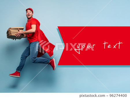 Deliveryman with pizzas acts like a powerful superhero. Concept of success and guarantee on shipment. Studio cyan background 96274400