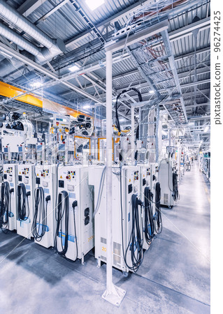 robots in a car plant robots in a car plant 96274425