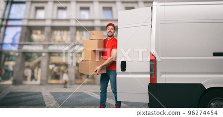 Red courier outside carries parcels with a withe van for deliveries of shipments. Red courier outside carries parcels with a withe van for deliveries of shipments. 96274454