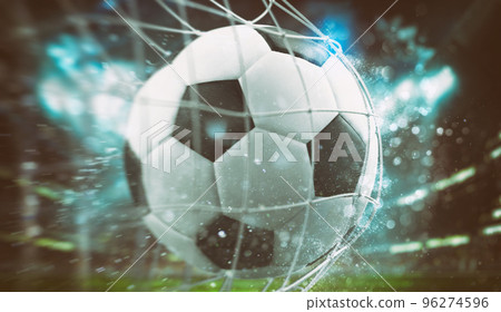 Close-up of a ball entering the net in a football match 96274596