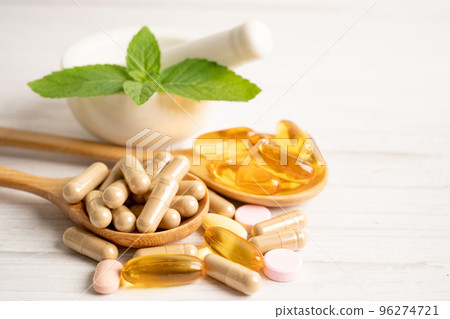 Alternative medicine herbal organic capsule with vitamin E omega 3 fish oil, mineral, drug with herbs leaf natural supplements for healthy good life. 96274721
