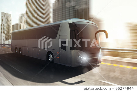 Grand tour bus moving fast on the highway with modern city in background Grand tour bus moving fast on the highway with modern city in background 96274944