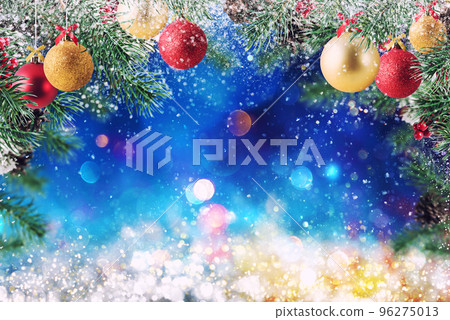 Christmas decoration with snow, pine and ball with sparkly background Christmas decoration with snow, pine and ball with sparkly background 96275013