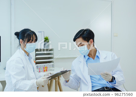 medical research laboratories, scientists analyze chemical samples Discuss technological innovations. Advanced scientific laboratories for medicine, biotechnology 96275560