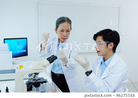 medical research laboratories, scientists analyze chemical samples Discuss technological innovations. Advanced scientific laboratories for medicine, biotechnology 96275588