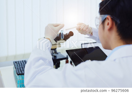 medical research laboratories, scientists analyze chemical samples Discuss technological innovations. Advanced scientific laboratories for medicine, biotechnology 96275606
