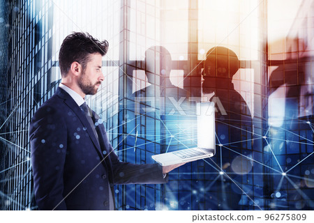 Businessperson in office connected on internet network with a laptop. concept of partnership and teamwork 96275809