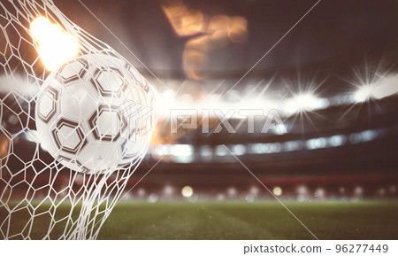 Soccer ball scores a goal on the net. 3D Rendering 96277449