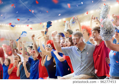 Football team supporter. Stadium in red and blue. Football team supporter. Stadium in red and blue. 96277453