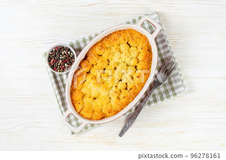 Shepherd's Pie or Cottage Pie, traditional British dish on white wooden background Shepherd's Pie or Cottage Pie, traditional British dish on white wooden background 96278161
