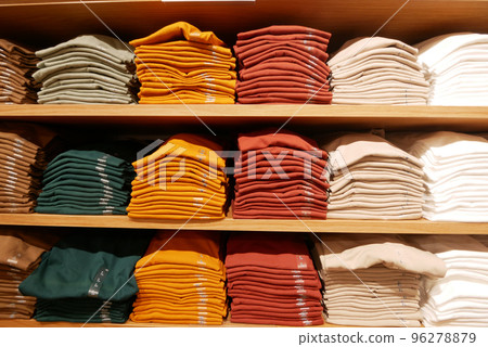 Close up of Colorful Shirts on shelf in a shop  96278879