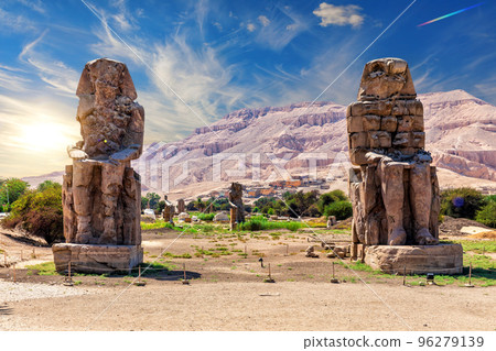 The Colossi of Memnon, famous statues of the Pharaoh Amenhotep in the Theban Necropolis of Luxor, Egypt 96279139
