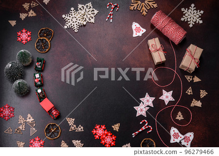 Home festive Christmas table decorated by toys and gingerbreads 96279466