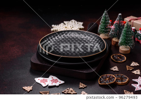 Home festive Christmas table decorated by toys and gingerbreads 96279493