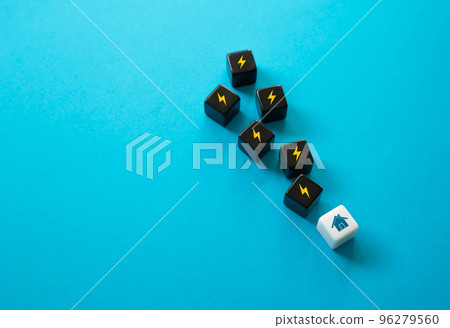 The residential building is losing energy. Energy inefficiency, heat loss and excess electricity consumption. Emissions, greenhouse gases, environmental impact. Electricity distribution systems losses 96279560