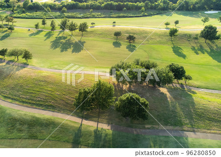 Top aerial view of beautiful park, green zone. Birds eye and drone photography of summer park. Nature landscape, green meadows in countryside in sunny day. Top aerial view of beautiful park, green zone. Birds eye and drone photography of summer park. Nature landscape, green meadows in countryside in sunny day. 96280850
