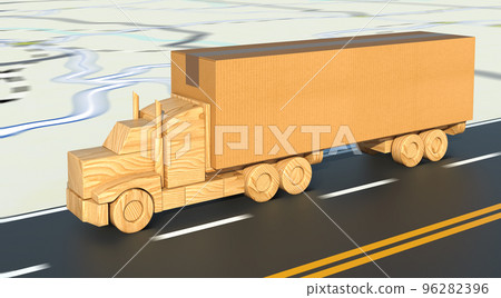 Wooden toy truck carrying a large cardboard box moves fast on the road. Wooden toy truck carrying a large cardboard box moves fast on the road. 96282396