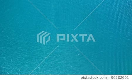 Aerial view of surface of sea. Blue water background 96282601