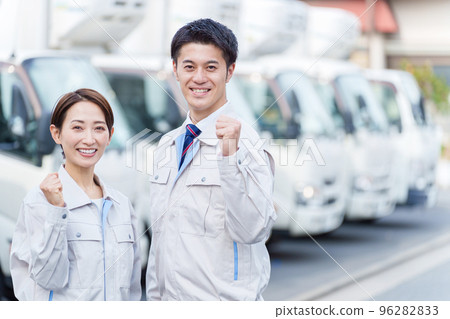 Worker doing a guts pose in front of the truck 96282833