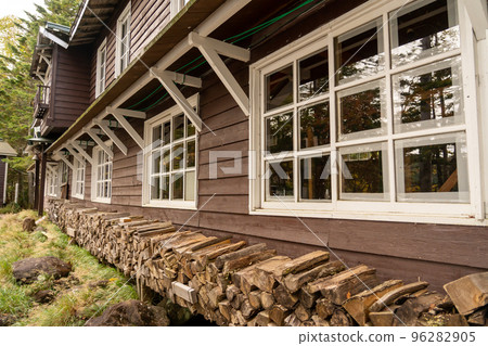 Stacked firewood at Shirakomaso, a mountain hut on the shores of Shirakoma Pond in Nagano Prefecture Stacked firewood at Shirakomaso, a mountain hut on the shores of Shirakoma Pond in Nagano Prefecture 96282905
