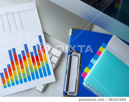 Business image of graphs, binders, documents, personal computers, notebooks Business image of graphs, binders, documents, personal computers, notebooks 96282989