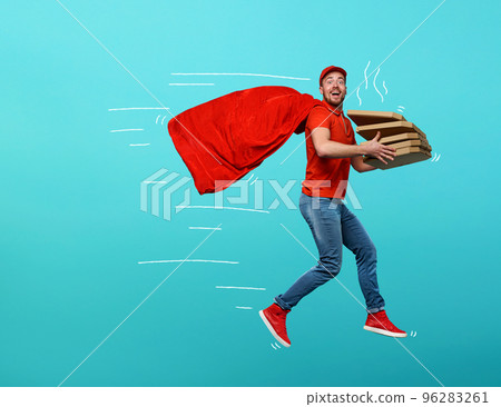 Deliveryman with pizzas acts like a powerful superhero. Concept of success and guarantee on shipment. 96283261