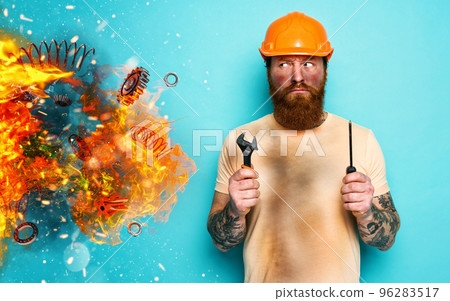 Worker is pensive about his work due to an explosion. concept of doubt and uncertainty. cyan background 96283517