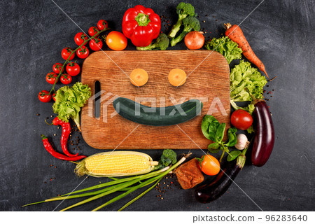 Healthy background of vegetable with a shape of smile. Concept of genuine food Healthy background of vegetable with a shape of smile. Concept of genuine food 96283640